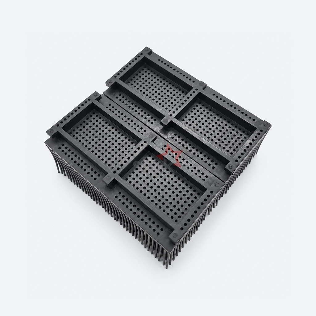 Black Nylon replacement bristle block for Takatori, 100 x 50 x 49 mm, Perforated-Rim Base, paired undersides with rows of holes in the outer rims.